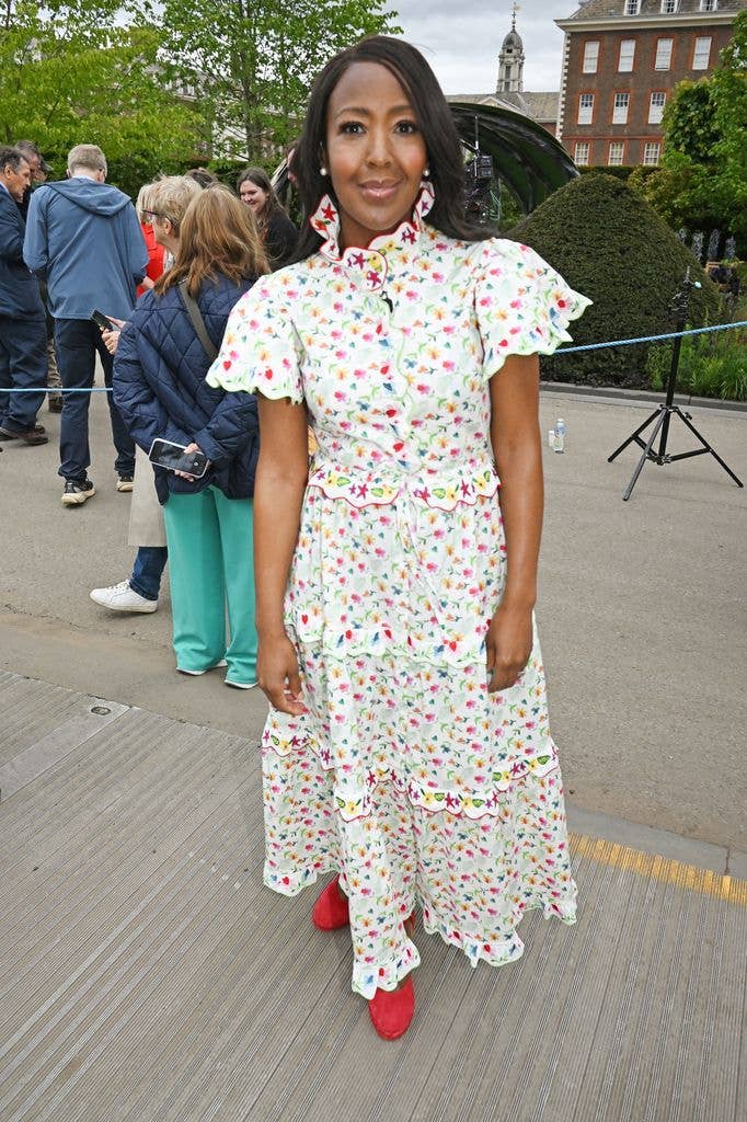 Angellica Bell wears a cream floral dress