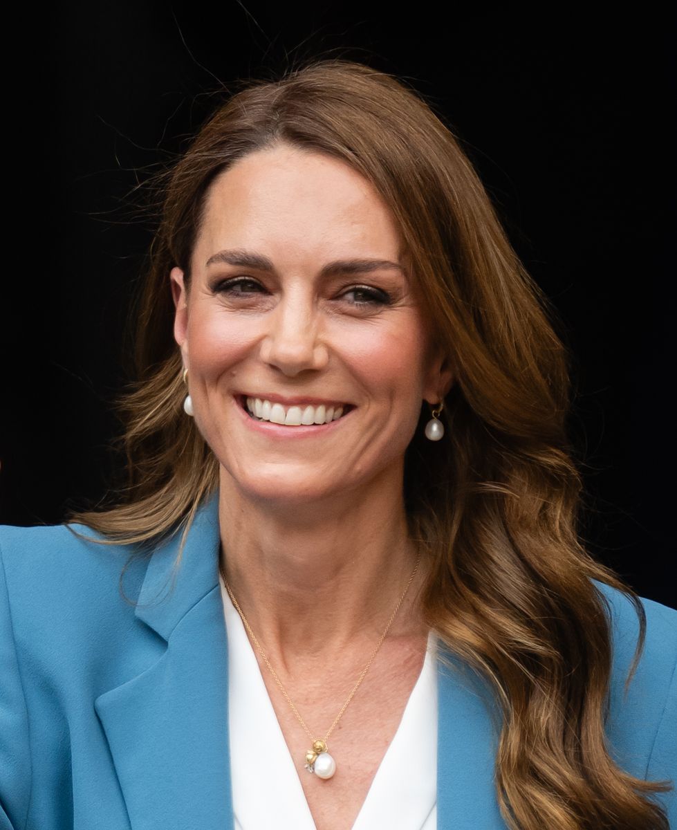 A close-up of the Princess’ choice of jewelry, which royal watchers are calling her "talismans" for this milestone trip.