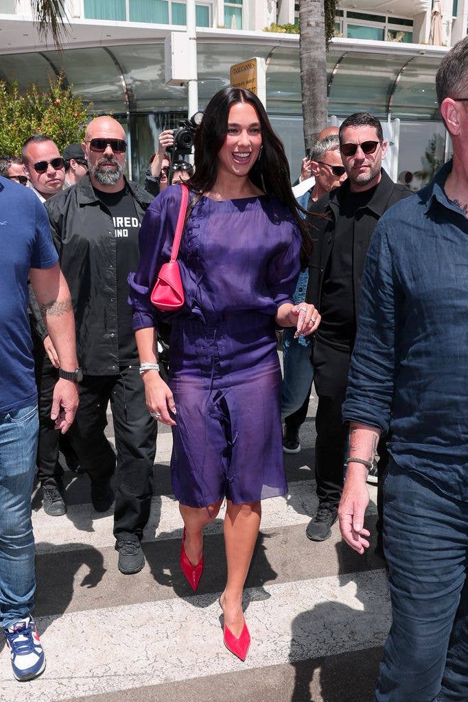 Dua Lipa in Ferragamo purple dress