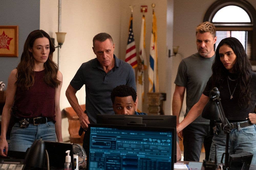 Marina Squerciati as Officer Kim Burgess, Jason Beghe as Hank Voight, LaRoyce Hawkins as Officer Kevin Atwater, Patrick John Flueger as Officer Adam Ruzek, Arienne Mandi as Eva Imani in Chicago PD