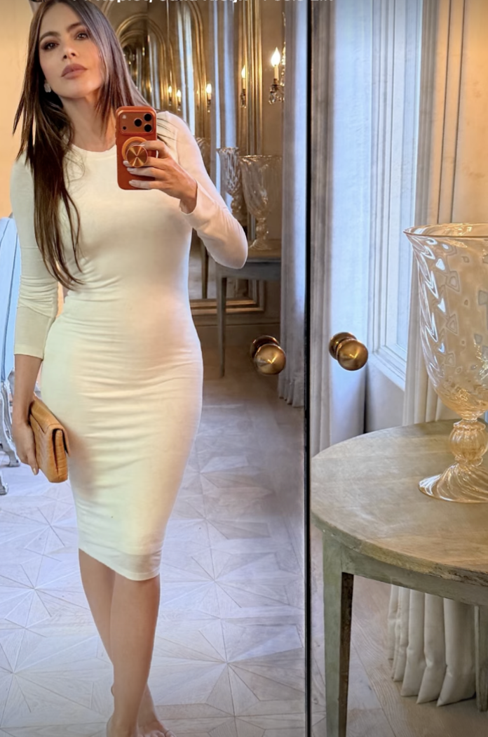 Sofía Vergara traded her signature sweetheart necklines for a sleek figure-hugging white midi dress during her Memorial Day weekend celebration.