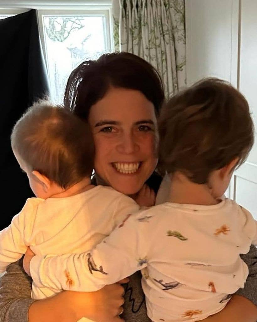 Eugenie hugging her sons