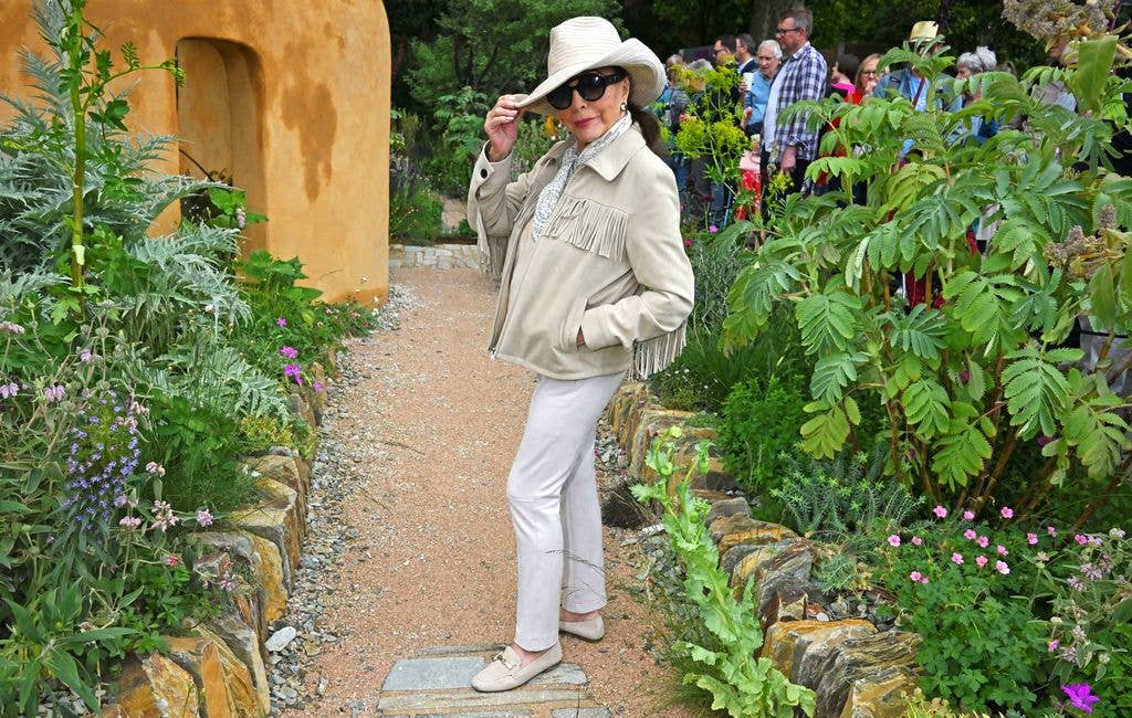 Dame Joan in garden in cowboy hat