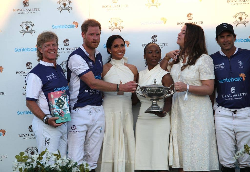 Dr Sophie Chandauka with Prince Harry and Meghan Markle at a Sentebale polo match in April last year
