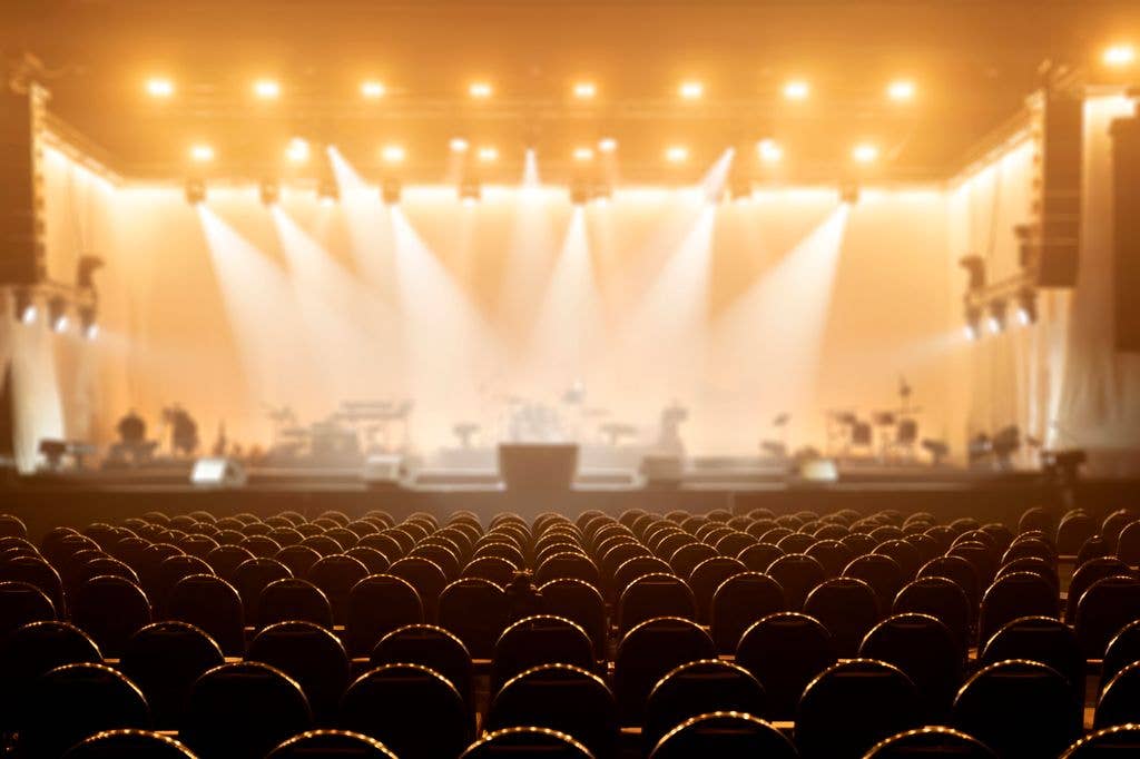 photo of blurred illuminated lights at music festival