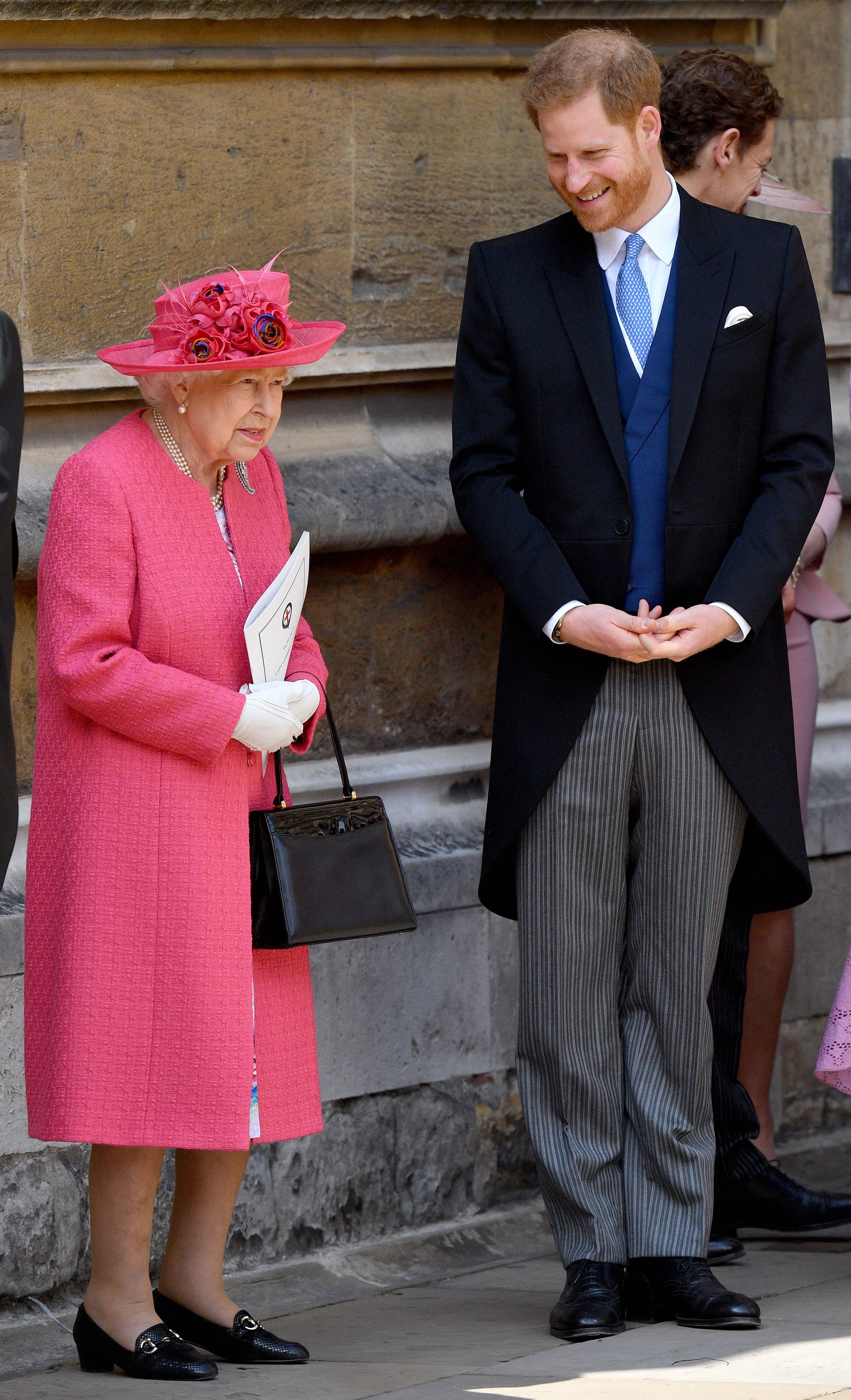Queen Elizabeth II and Prince Harry attend the wedding of Lady Gabriella Windsor and Thomas Kingston at St George's Chapel on May 18, 2019