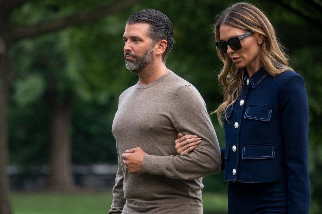 Donald Trump Jr. walks with Bettina Anderson as they arrive on the South Lawn of the White House in Washington, DC