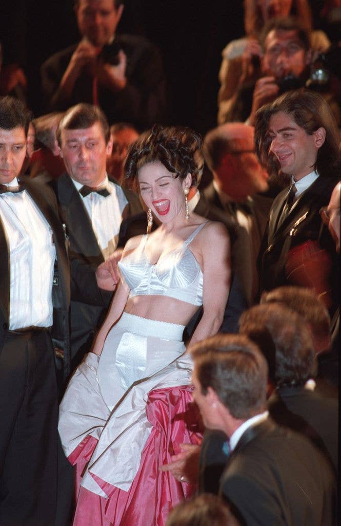 Madonna in cone bra arrives for the premiere of her film 'In Bed with Madonna' in 1991 at the Cannes Film Festival, France