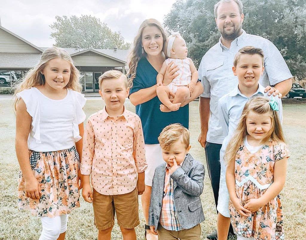 Anna and Josh Duggar, pictured in 2019, with their first six childen