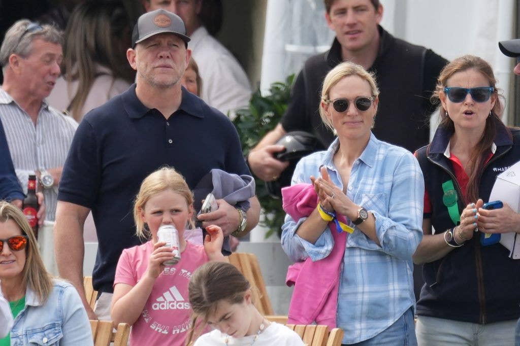 The Tindalls in field watching horse trials