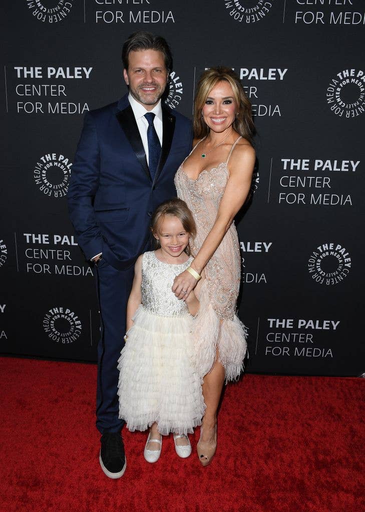 Sara with her husband and daughter