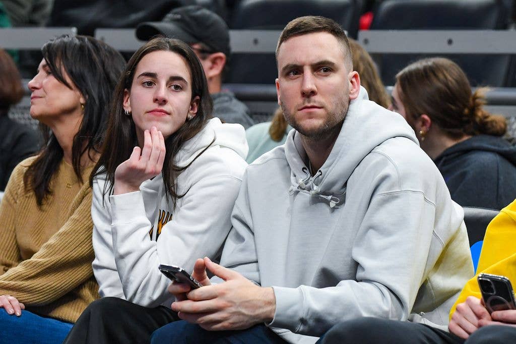 WNBA star and former Iowa Hawkeye Caitlin Clark (L) and boyfriend Connor McCaffery attend a Big Ten Women's Basketball Tournament - Second Round game between the Iowa Hawkeyes and the Michigan State Spartans at Gainbridge Fieldhouse on March 06, 2025 in Indianapolis, Indiana. The Iowa Hawkeyes won the game 74-61. 
