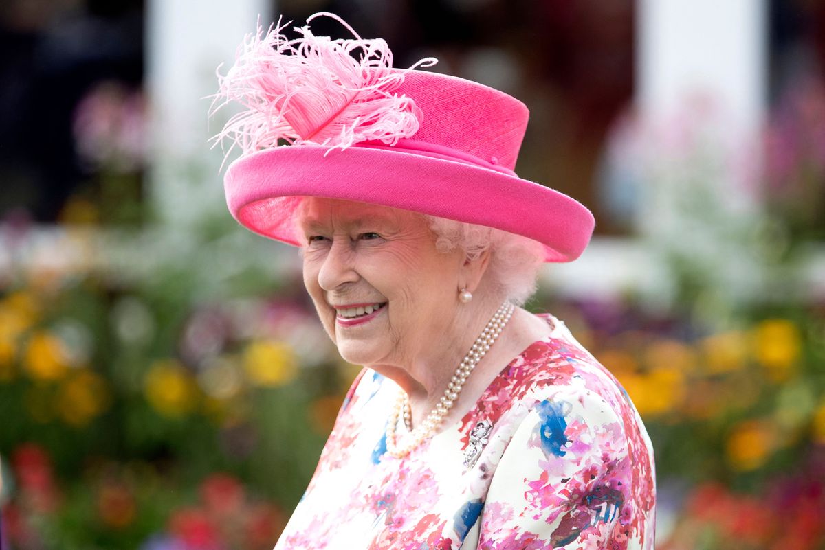 Britain's Queen Elizabeth II hosts the annual garden party at the Palace of Holyroodhouse in Edinburgh on July 4, 2018