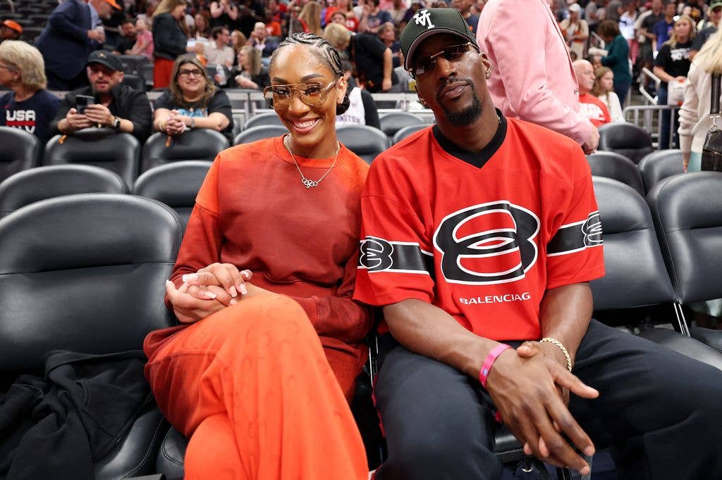 A'ja Wilson #22 of the Las Vegas Aces talks with boyfriend Bam Adebayo of the Miami Heat prior to the WNBA STARRY 3-Point Contest during the 2025 AT&T WNBA All-Star weekend at Gainbridge Fieldhouse on July 18, 2025 in Indianapolis, Indiana. NOTE TO USER: User expressly acknowledges and agrees that, by downloading and or using this photograph, User is consenting to the terms and conditions of the Getty Images License Agreement.