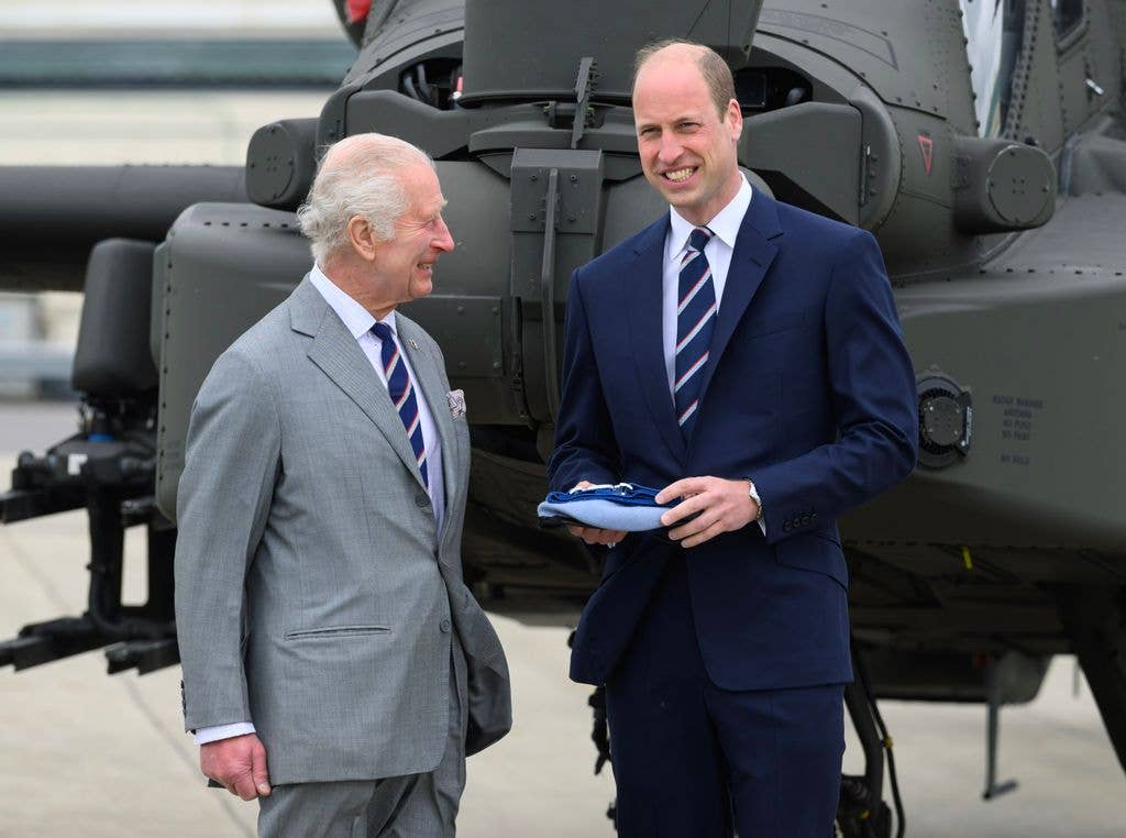 Proud dad King Charles smiled at his firstborn, Prince William, as the monarch handed over the role of Colonel-in-Chief of the Army Air Corps to his son in 2024.