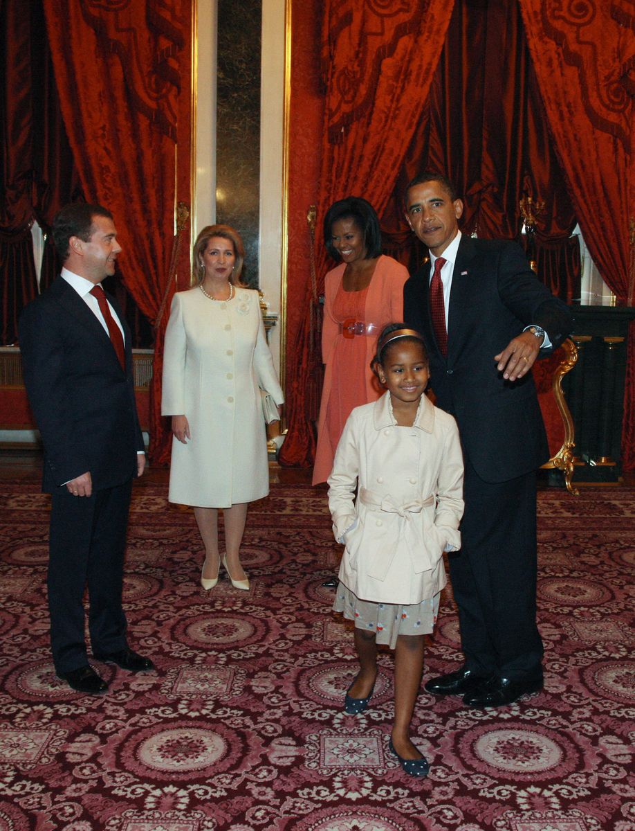 Russian President Dmitry Medvedev (L) and his wife Svetlana (2L) meet with US President Barack Obama, his wife Michelle look and their daughters Sasha and Malia at the Kremlin in Moscow on July 6, 2009.  MIKHAIL KLIMENTYEV/AFP via Getty Images)