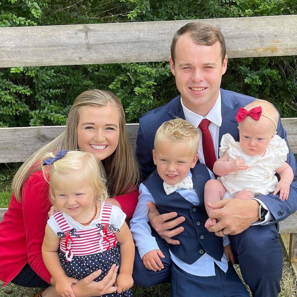 Kendra and Joseph Duggar with 3 children, pictured in 2021