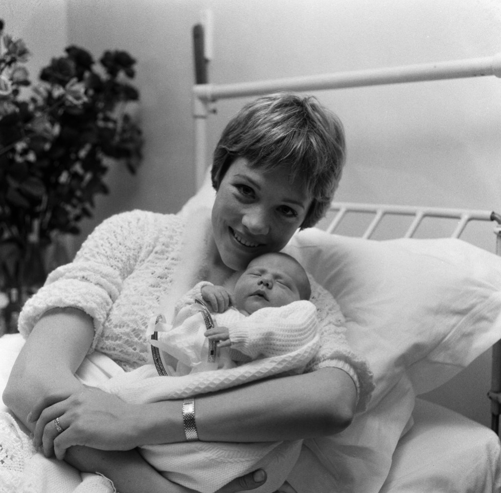 Actress Julie Andrews of 'My Fair Lady' fame pictured in the London Clinic with her new baby daughter which she will name either Emma, Kate, Sarah or Joanna. It was also announced today that Julie will make her film debut in Walt Disney's 'Mary Poppins.' 28th November 1962. (Photo by Monte Fresco/Mirrorpix/Getty Images)
