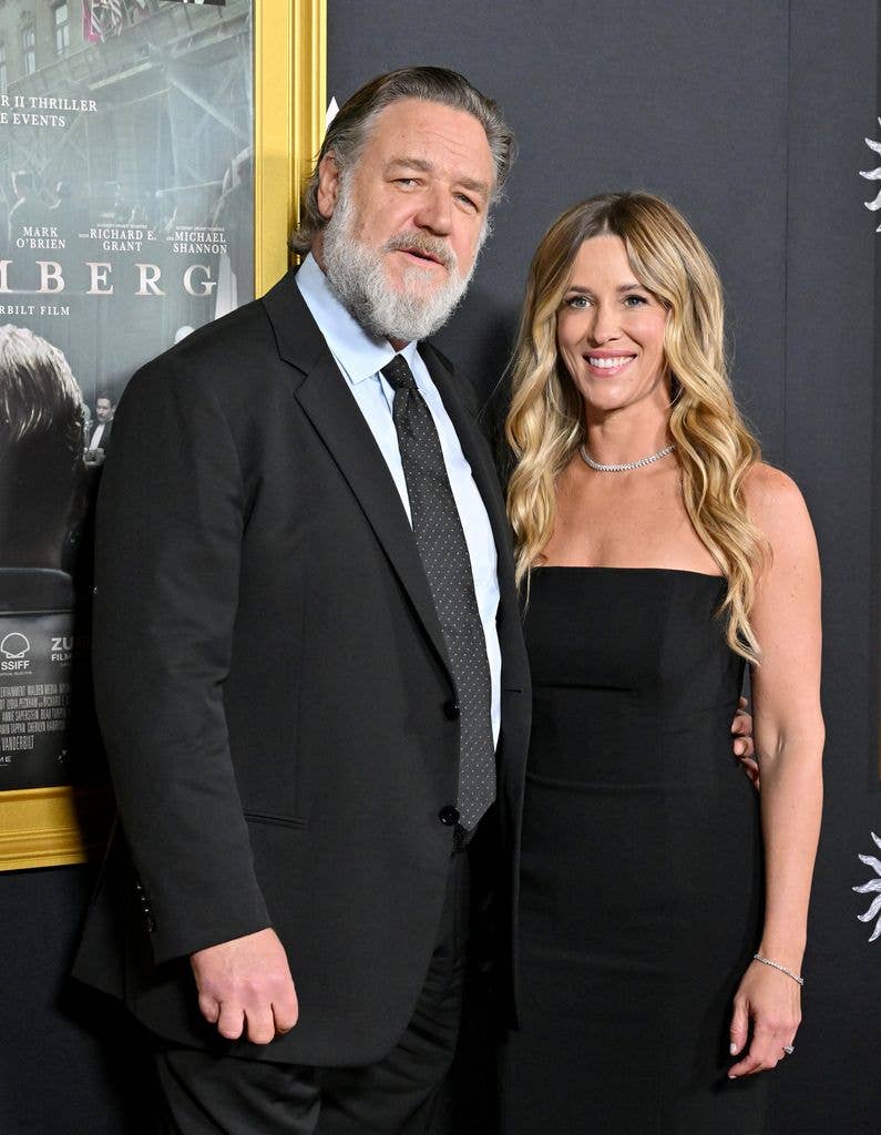 Russell Crowe and Britney Theriot attend the 2025 AFI FEST premiere for Nuremberg