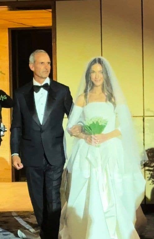 photo of john molner walking daughter down the aisle