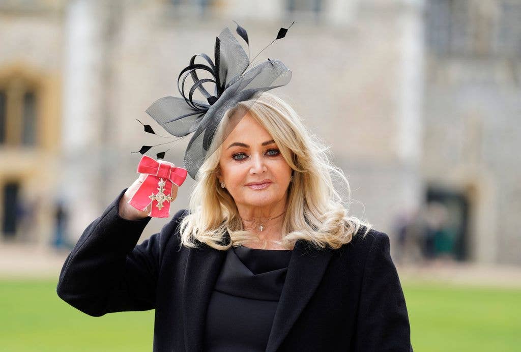 Gaynor Sullivan, also known as Bonnie Tyler, with her MBE after being made a Member of the Order of the British Empire by the Prince of Wales during an investiture ceremony at Windsor Castle on February 1, 2023 