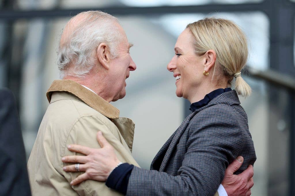 Charles smiled as he embraced his niece Zara Tindall with a hug at the 2024 Royal Windsor Horse Show.