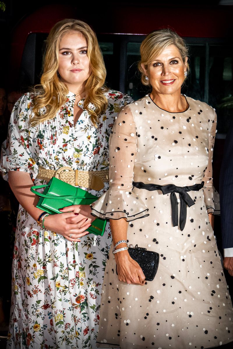 Beside Queen Maxima, Amalia appeared more reserved, carefully observing rather than leading.