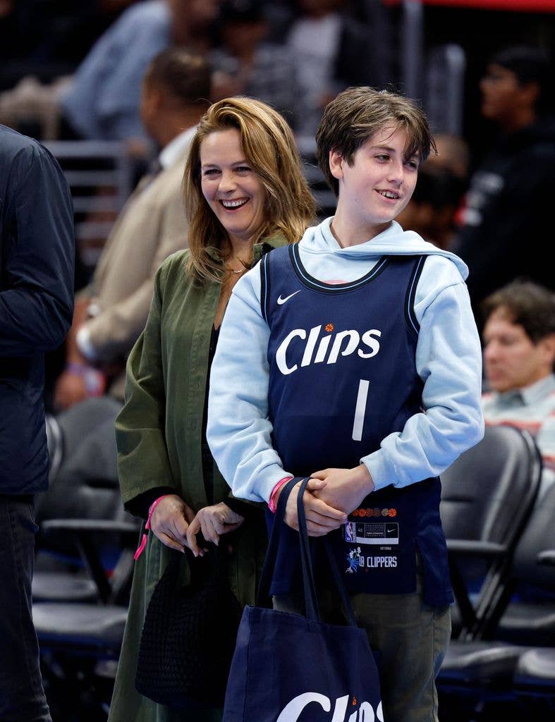 Alicia Silverstone and her son, Bear Blu, attend a basketball game between the Los Angeles Clippers and Houston Rockets 