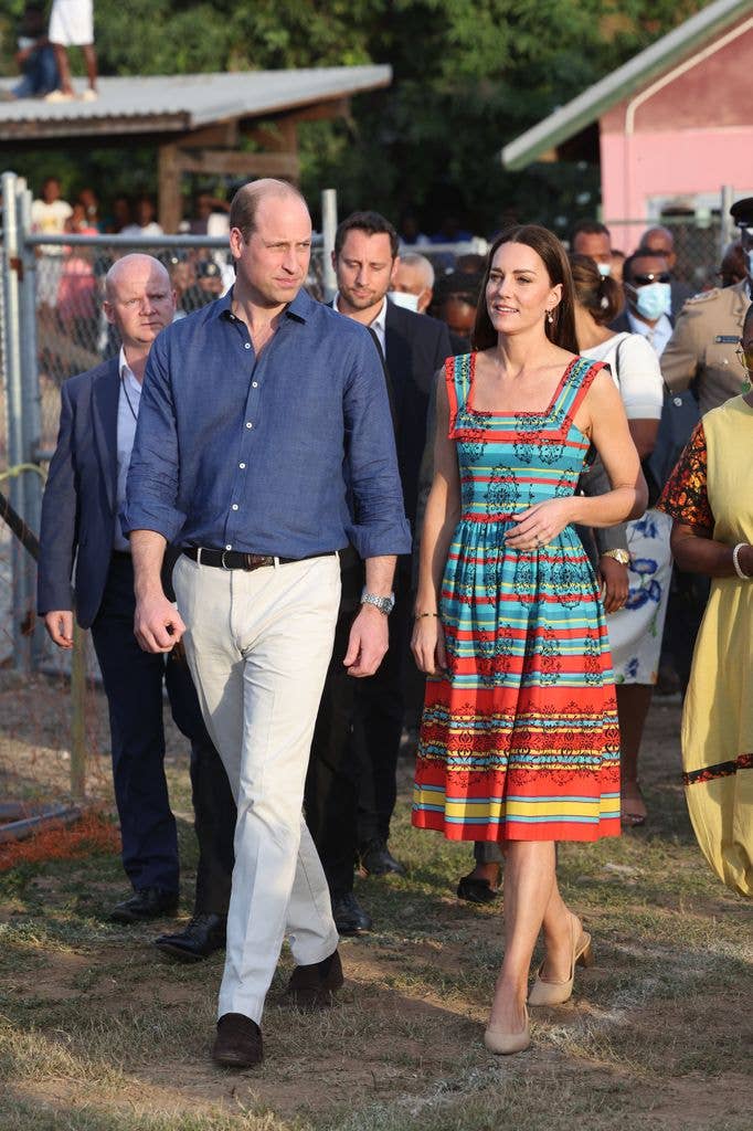 Kate in printed sundress outside with william