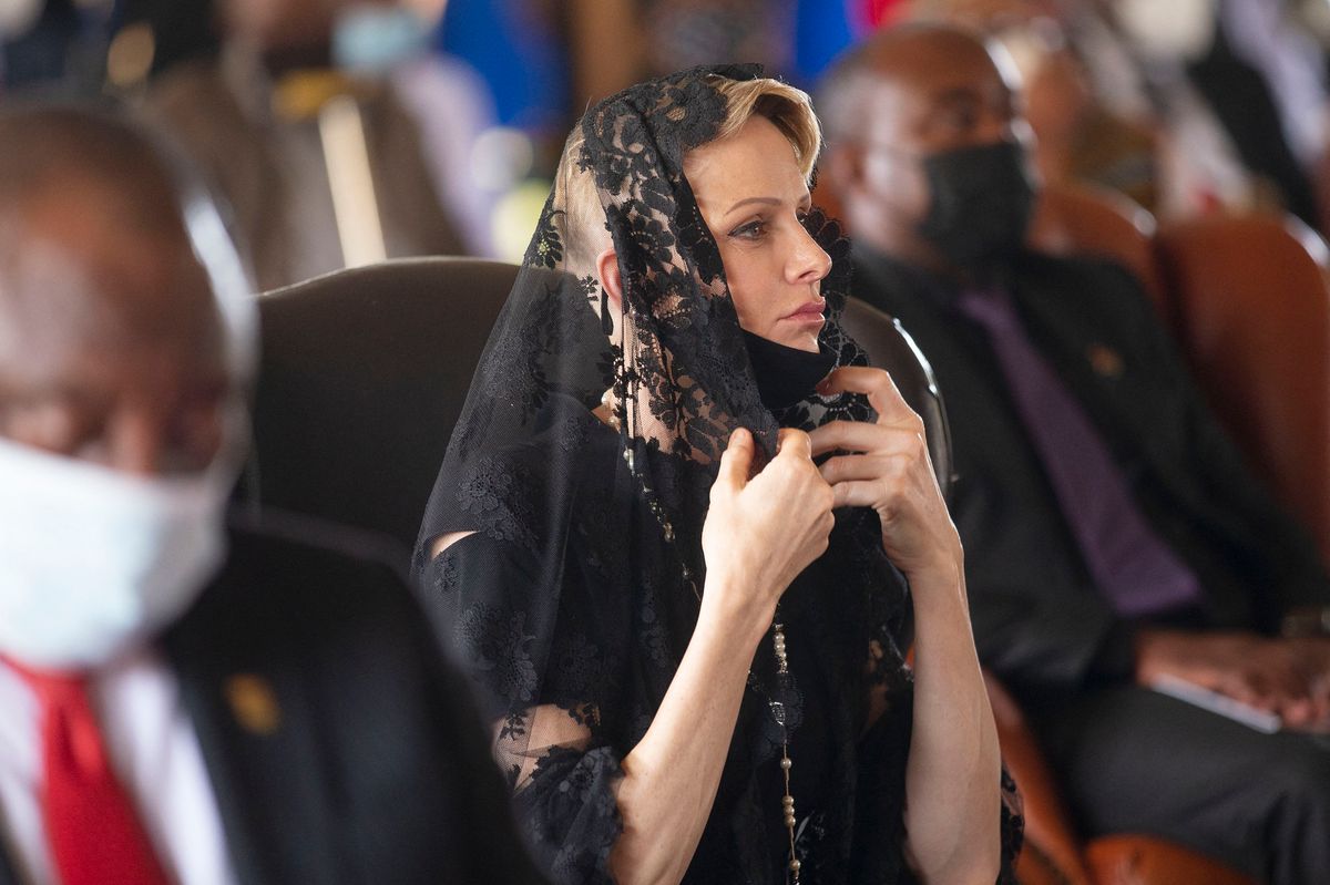 Charlene, Princess of Monaco (C) reacts during the memorial service of King Goodwill Zwelithini at the KwaKhethomthandayo royal palace in Nongoma, South Africa, on March 18, 2021.