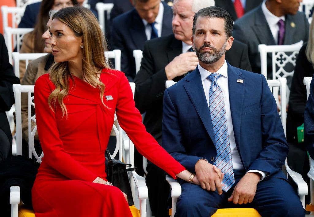 Donald Trump Jr. sits with his girlfriend Bettina Anderson prior to a Presidential Medal of Freedom ceremony in the Rose Garden of the White House