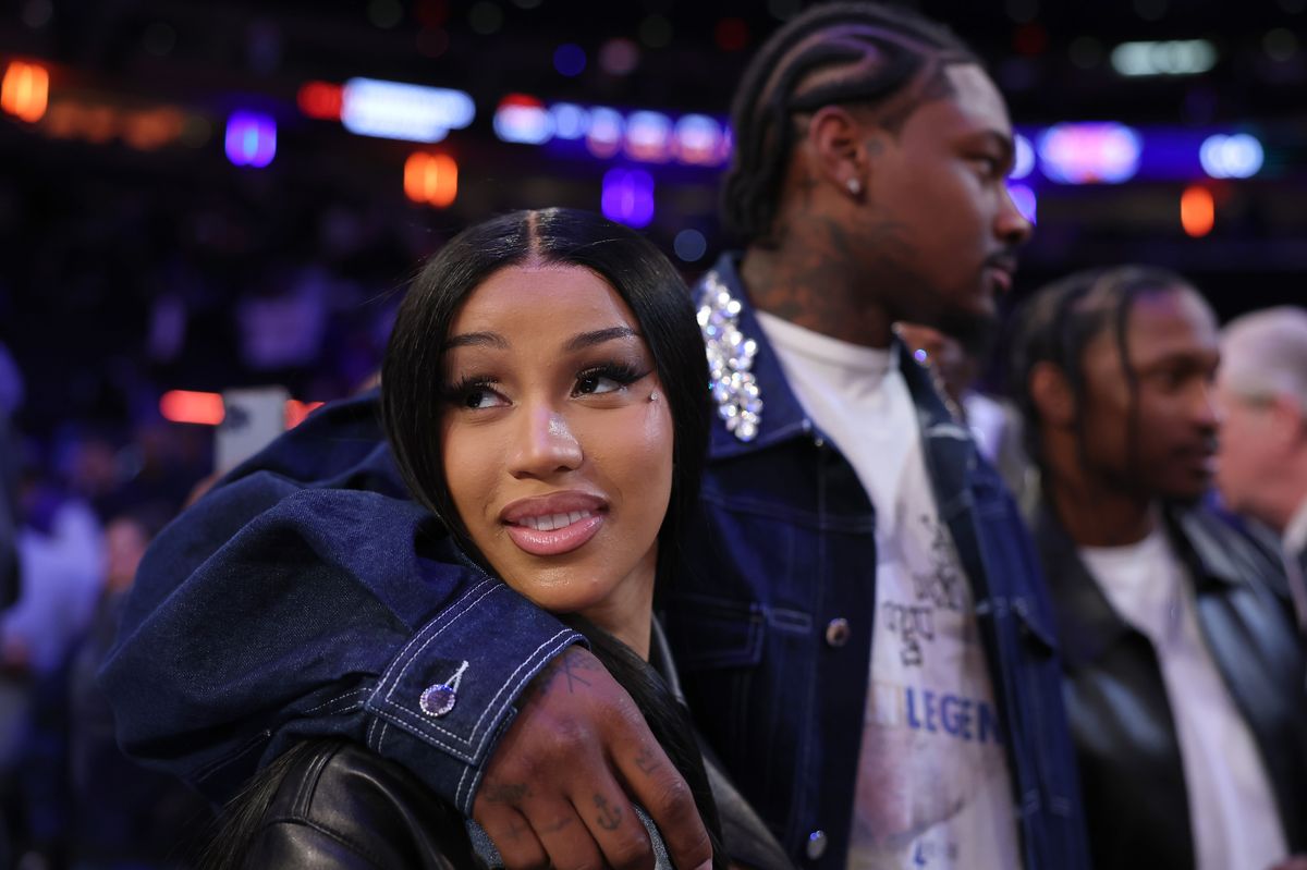 NEW YORK, NEW YORK - MAY 12: NFL Player Stefon Diggs (R) and rapper Cardi B (L) celebrate after Game Four of the Eastern Conference Second Round NBA Playoffs between the Boston Celtics and the New York Knicks at Madison Square Garden on May 12, 2025 in New York City. NOTE TO USER: User expressly acknowledges and agrees that, by downloading and or using this photograph, User is consenting to the terms and conditions of the Getty Images License Agreement. (Photo by Elsa/Getty Images) 