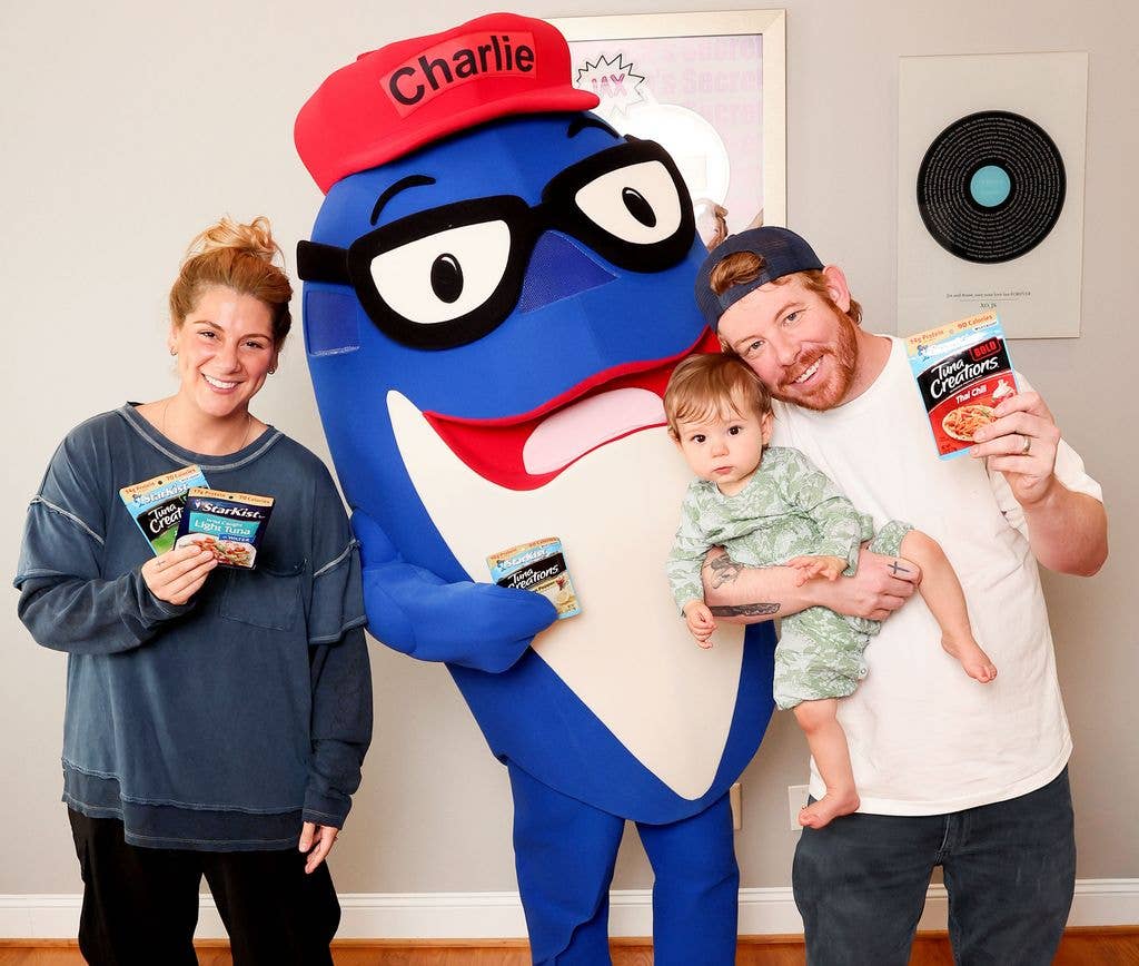 Jax, her husband and their baby with StarKist mascot