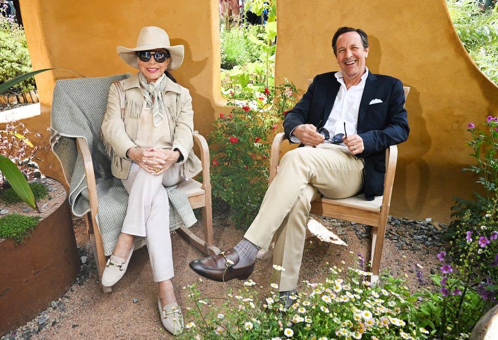 Dame Joan Collins' husband Percy Gibson was also in attendance
