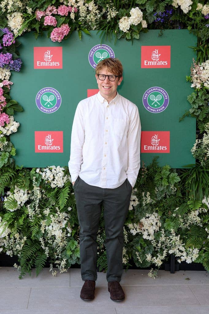 Josh Widdicombe smiling in a white shirt