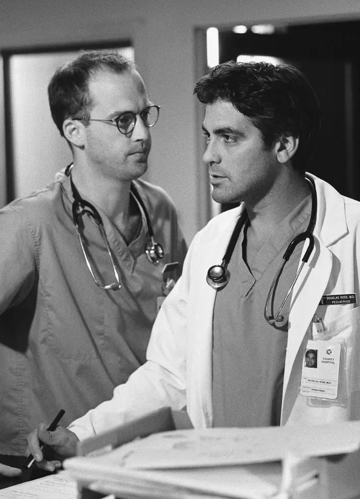 Anthony Edwards as Doctor Mark Greene, left, and George Clooney as Doctor Doug Ross during a scene from ER