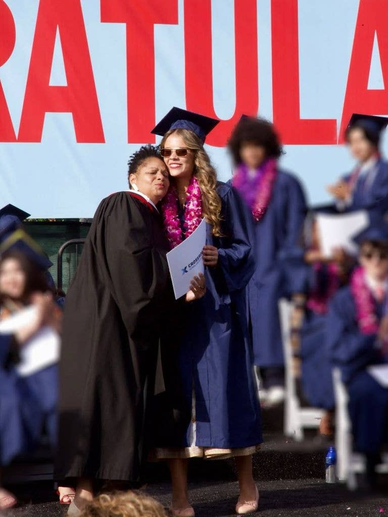 Honor receiving her graduation certificate onstage