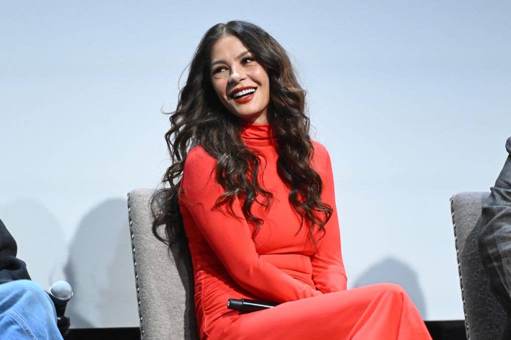 photo of catherine zeta jones in red dress laughing