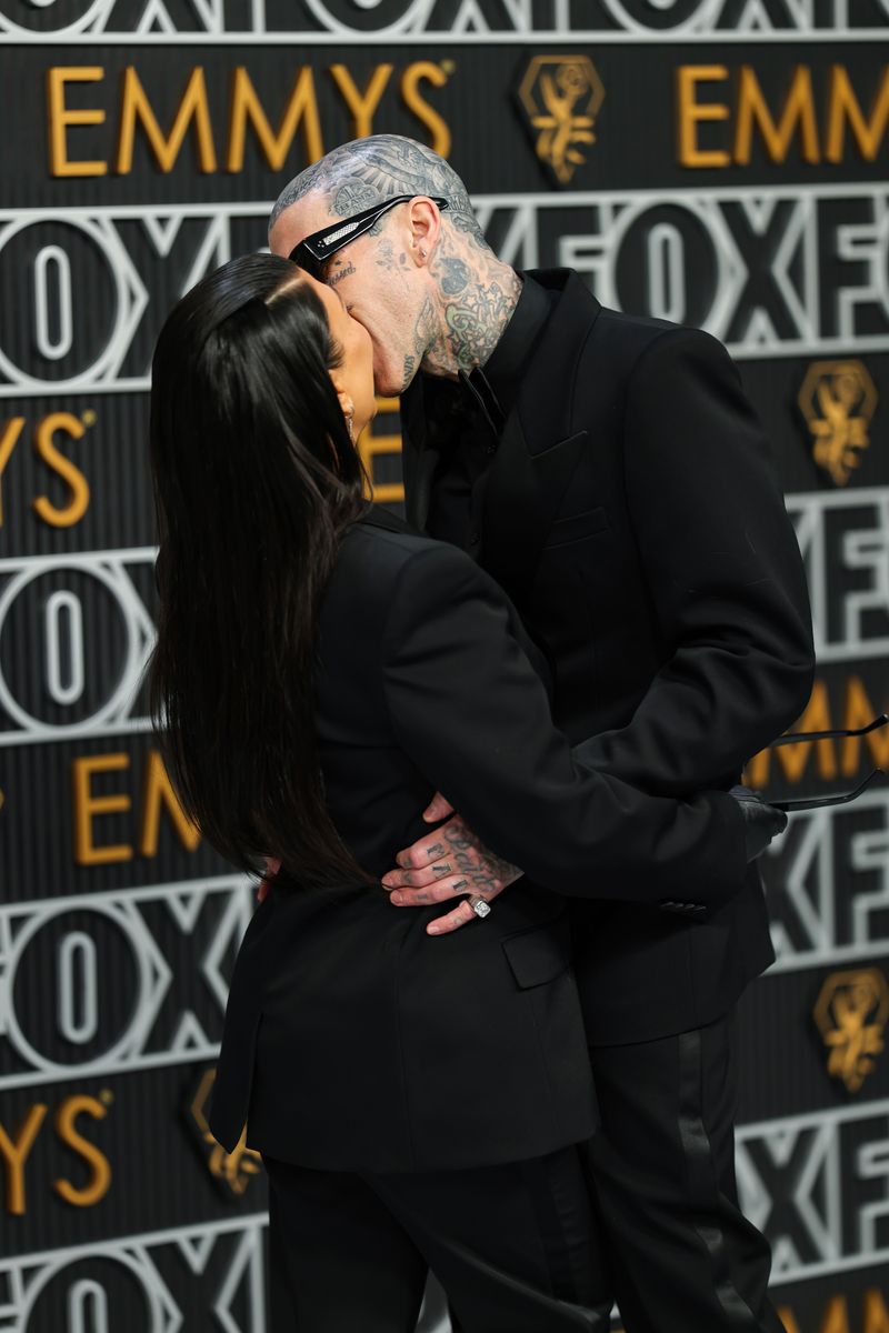 Kourtney Kardashian and Travis Barker famous french kiss at the 75th Primetime Emmy Awards