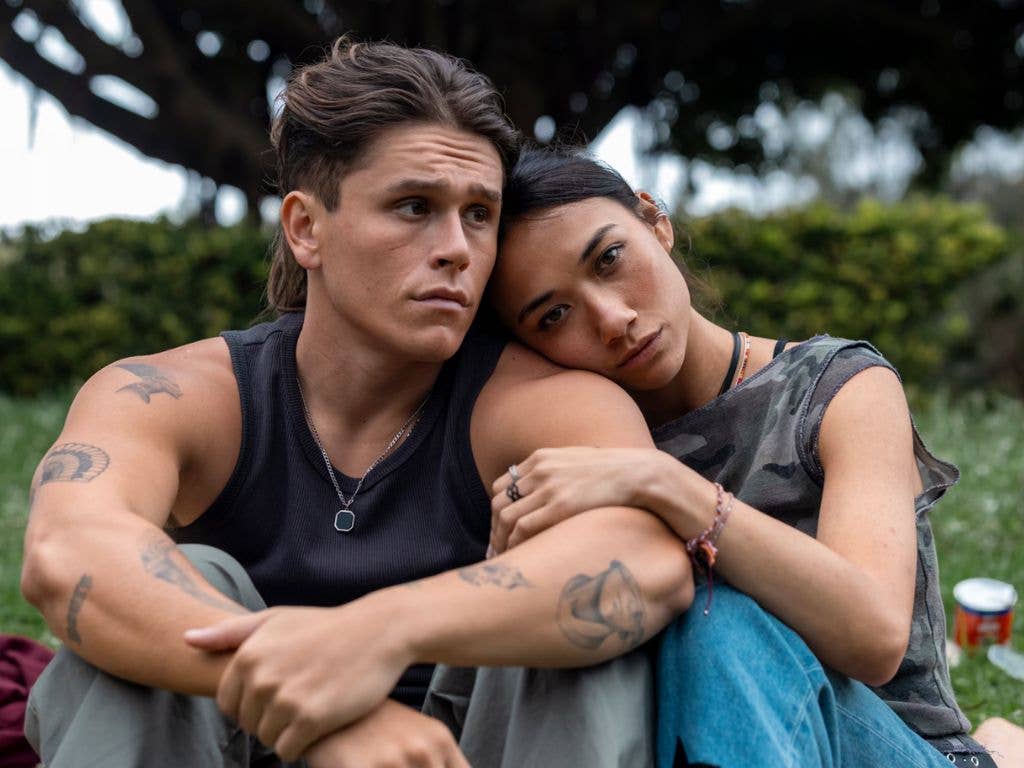 Two people embracing in a still from Critical Incident