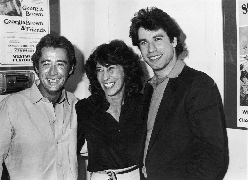 John Travolta stands next to sister Ellen and borther Sam at the Westwood Playhouse.