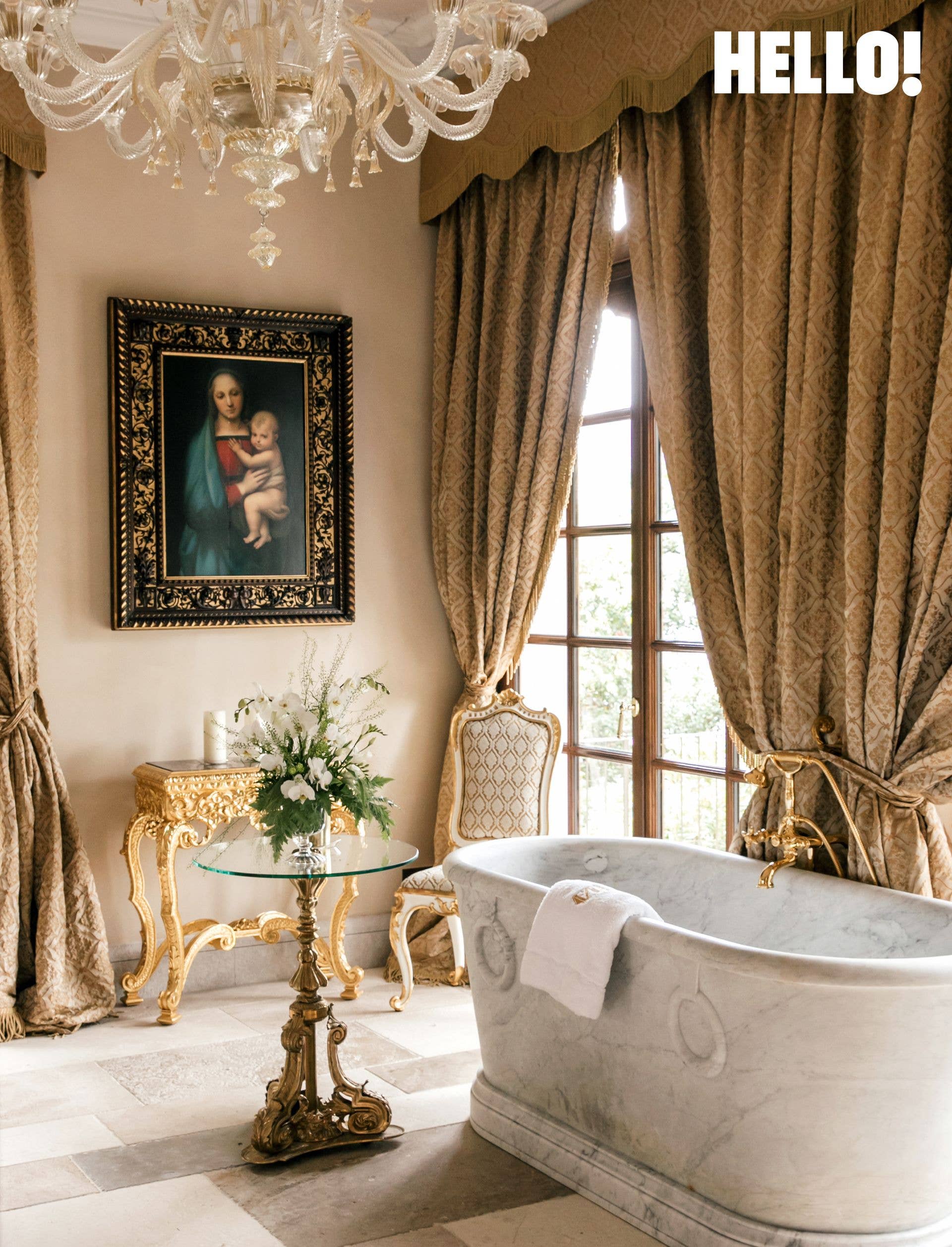 An antique marble bathtub inside the bathroom in Villa Portesina