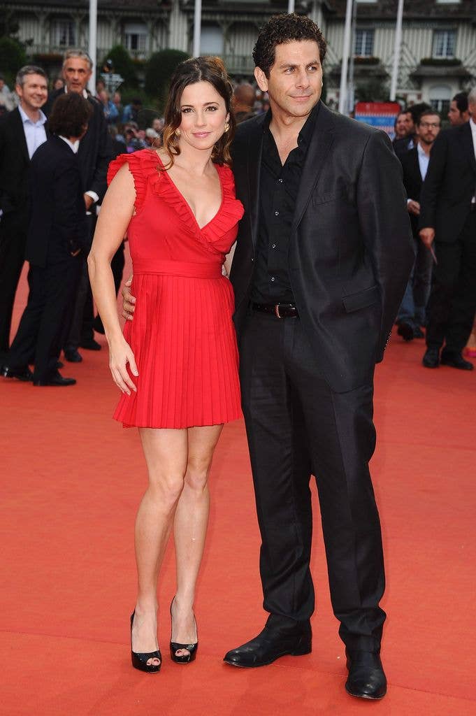 Linda Cardellini (L) and Steven Rodriguez arrives with a guest at the Closing Ceremony of the 37th Deauville American Film Festival  on September 10, 2011 in Deauville, France