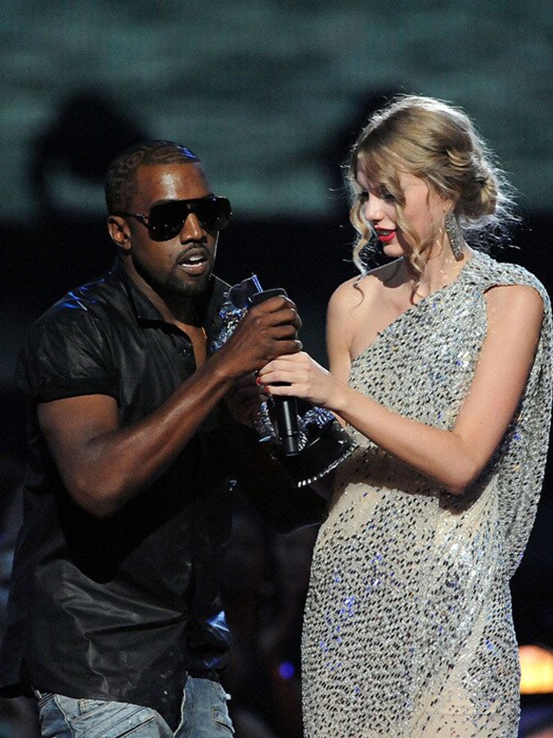 <b>September 13, 2009 B.K. (Before Kim)</b>
<br>
In what now feels like a long time ago in a galaxy far, far away or the MTV VMAs Kanye West and Taylor Swift's paths crossed setting the wheels in motion for what is perhaps one of our generation's greatest celebrity feuds. On this fateful evening, Taylor took home the Best Female Video Award for <i>You Belong With Me</i>.
</br><br>
However, the country singer's moment of glory was cut short when Kanye jumped on stage and took her mic. The rapper then proceeded to address the audience goers (including a shocked Beyonce), "Yo Taylor, I'm really happy for you, I'll let you finish, but Beyonce has one of the best videos of all time. One of the best videos of all time!"
</br><br>
Photo: Jeff Kravitz/FilmMagic