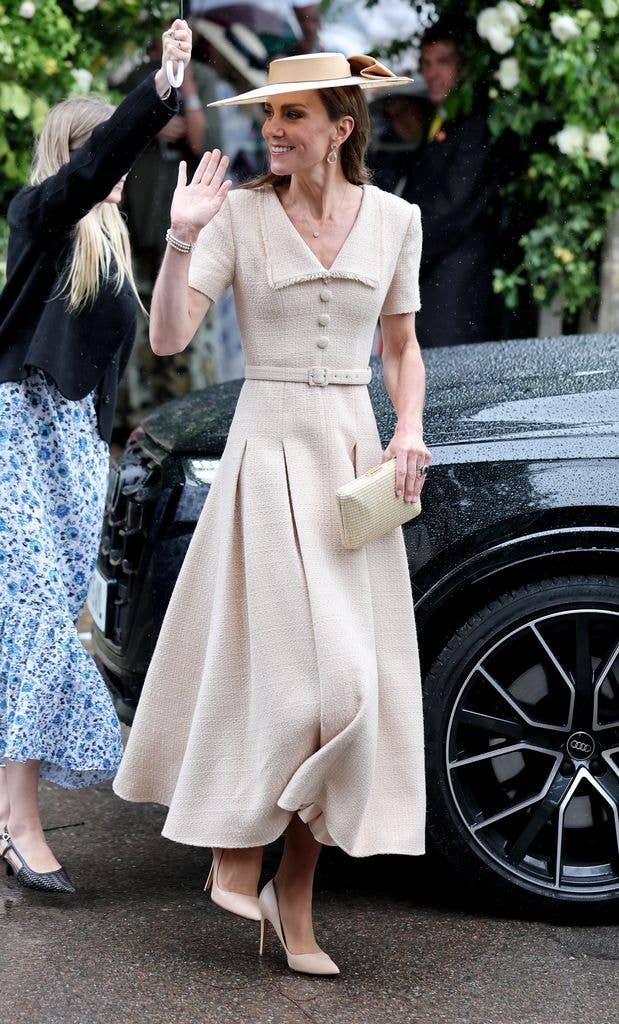 A photo of Kate Middleton waving