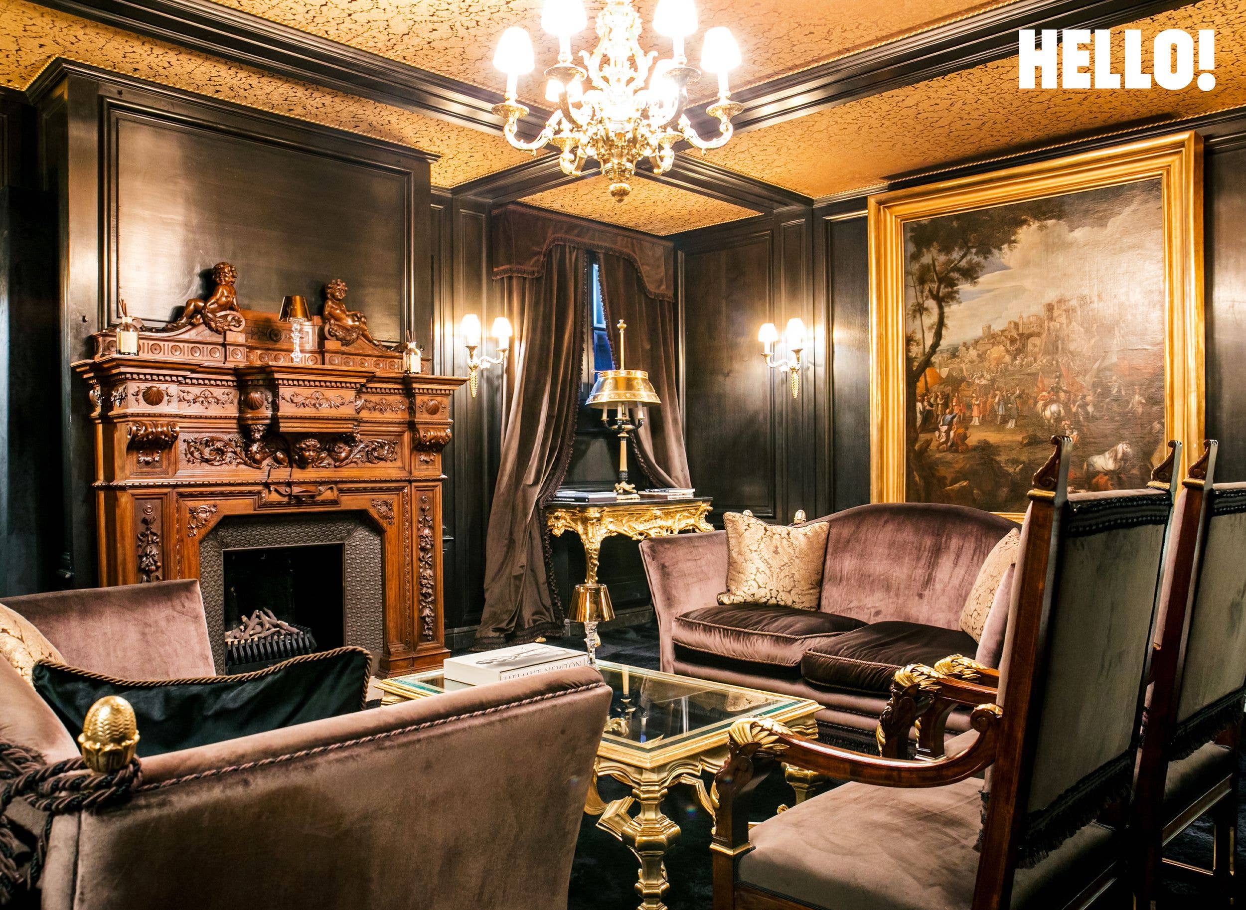The fumoir (smoking room), with a light walnut French fireplace inside Villa Portesina