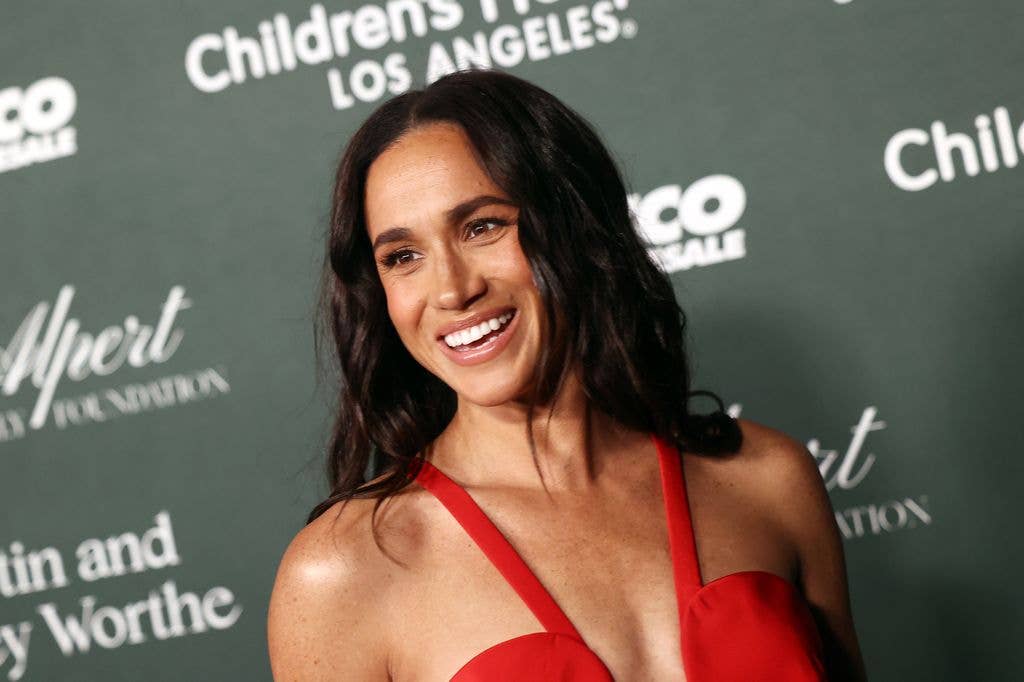 Meghan Markle in a red dress.