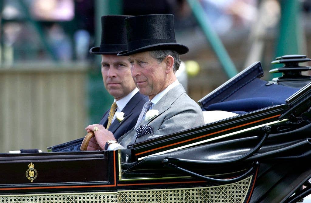 Andrew is pictured arriving in a carriage with Charles at Royal Ascot 2002