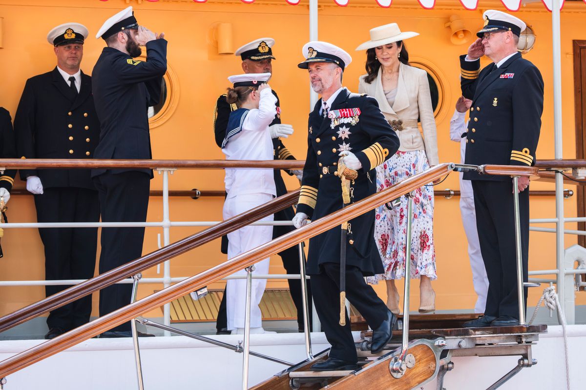 From tailored separates to a vibrant red dress, Queen Mary's style was the highlight of the day.