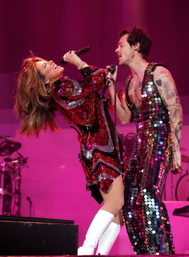 Shania Twain and Harry Styles perform onstage at the Coachella Stage during the 2022 Coachella Valley Music And Arts Festival on April 15, 2022 in Indio, California.